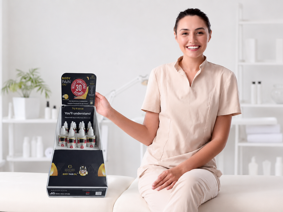Golden Dew Drop stocked counter display beside a massage professional